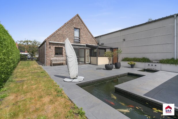 Woning met 3 slpks, grote loods (240 m²) en zonnige tuin!