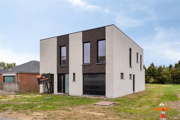 Open bebouwing met vier slaapkamers en twee badkamers te Tremelo