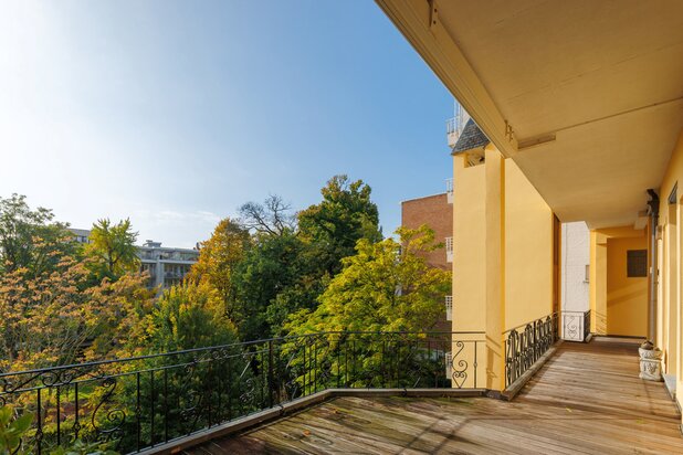 Elegant eclectic living with park view