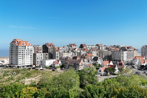 Ruim duplexappartement met 4 slaapkamers en zonneterras     