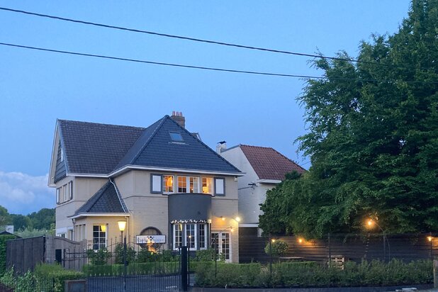 Exclusief woonhuis met handelsruimte te Merelbeke-Melle