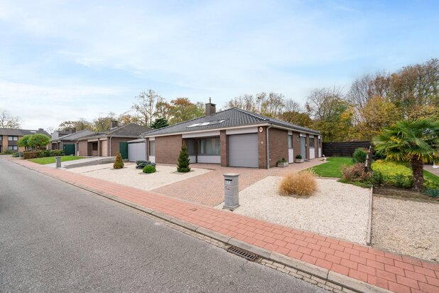 Moderne gelijkvloerse woning met aangelegde tuin