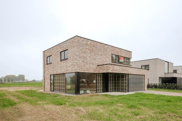 Energiezuinige open bebouwing met zicht op de velden