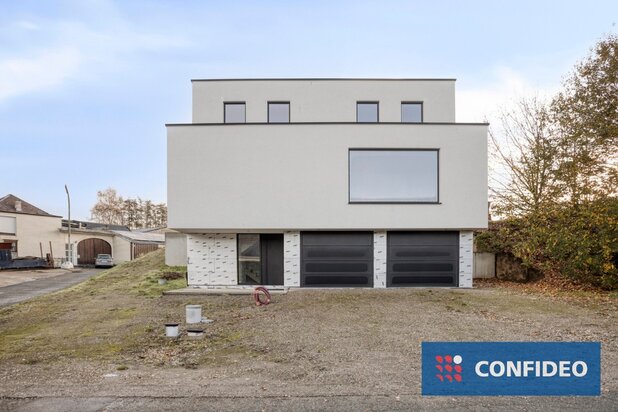 Moderne, af te werken woning op een perceel van 10a 58ca.