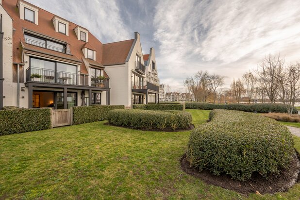 Zonnig tuinappartement aan het meer van Duinenwater