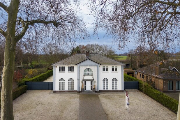 Tijdloze elegante villa met praktijkruimte (422 m²) op perceel van 1.672 m²