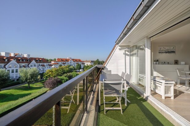 Zonnig appartement in villaresidentie met schitterend terras