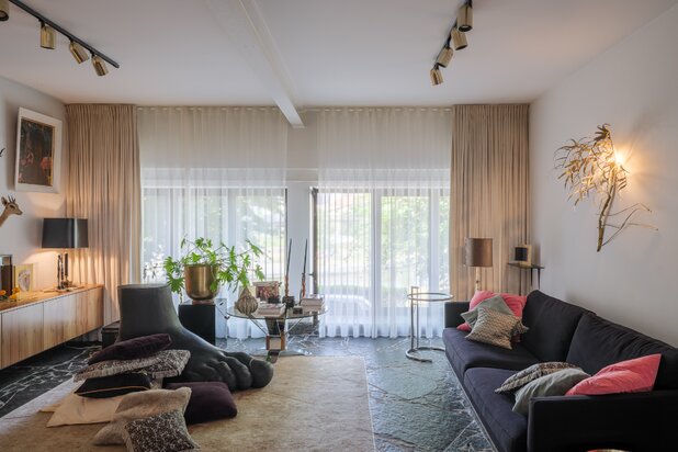 Imposant designappartement met loftallures nabij het Wintercircus en De Krook