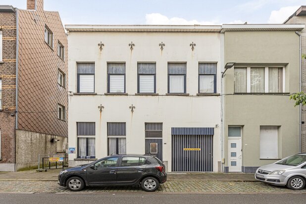 WONING/PROJECTGROND OP EEN BOOGSCHEUT VAN ANTWERPEN
