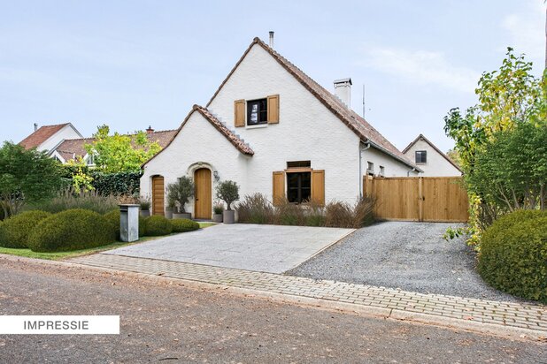 Residentieel gelegen instapklare villa op een prachtig aangelegd perceel van 2265m² te Heusden-Zolder.