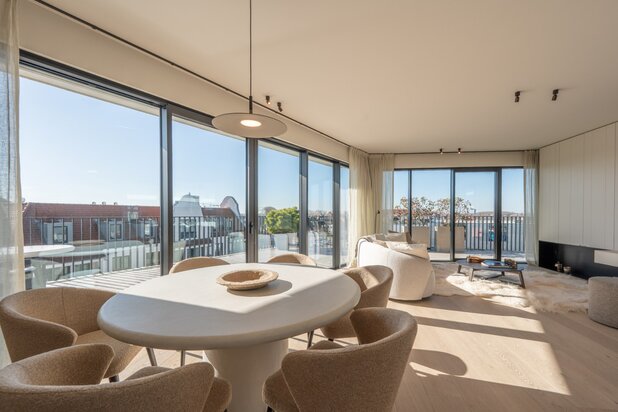 Uitzonderlijk prachtig appartement met luxe afwerking, volledig omringd door terrassen (ca. 100m²) in Duinenwater met open zichten