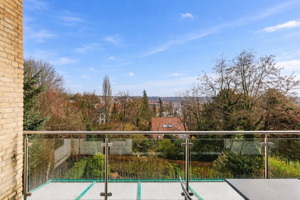 Duplex penthouse avec terrasses et garage