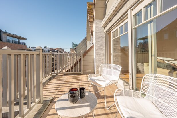 Appartement  avec terrasses ensoleillées, 3 chambres et double parking dans l'immeuble