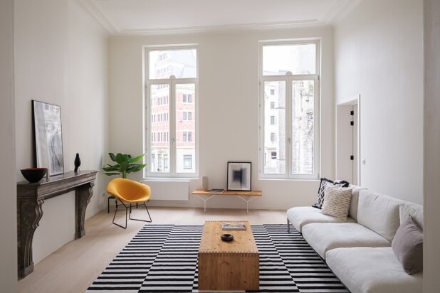 Luxueus appartement met groot volume en terras op toplocatie aan de Sint-Michielskerk