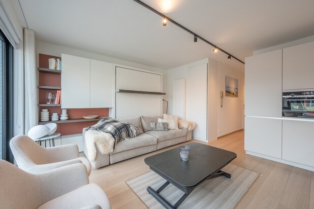 Appartement met schitterend zonneterras en zijdelings zeezicht vlakbij het Driehoeksplein in het Zoute.