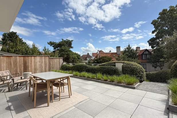 Luxueus tuinappartement met zonovergoten terrassen...