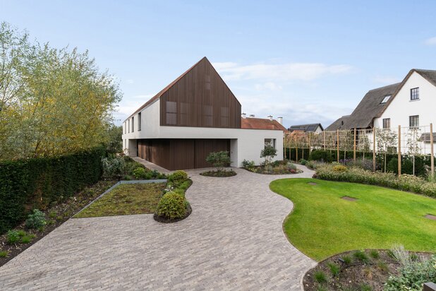 Luxury villa for sale Knokke high-end finishes pool garden garage fireplace