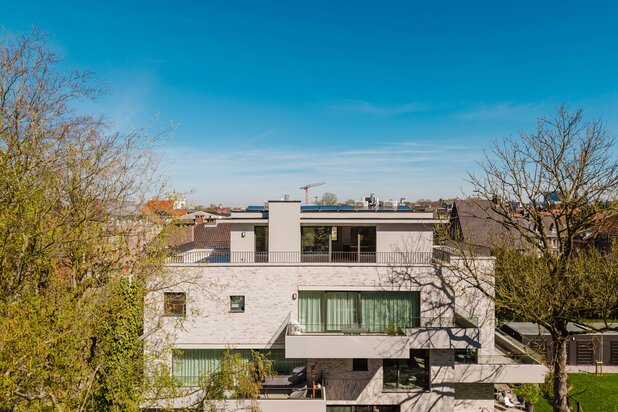 Luxueuze nieuwbouw penthouse omgeven door groen te Gent.