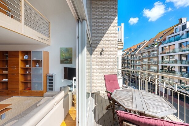 Lichtrijk mezzanine-appartement met 3 slaapkamers op topligging.