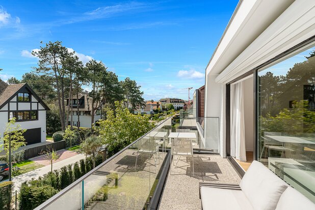 Elegante duplex met zuidgericht terras in villaresidentie