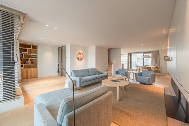 Duplex apartment with luxurious finishes and a side view of the sea in Het Zoute