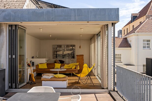 Triplex appartement met historisch karakter en zonnig dakterras