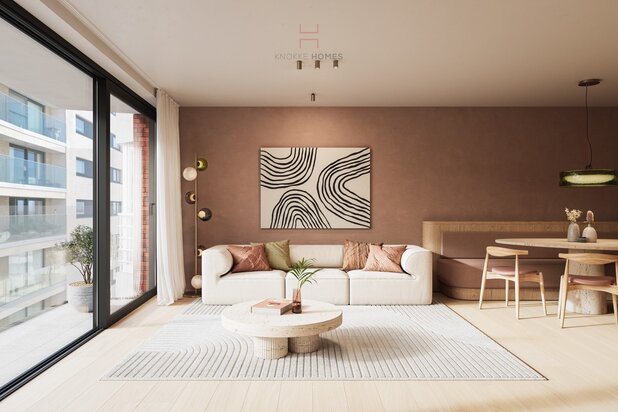 Elegant full-floor nieuwbouwappartement met brede leefruimte, terrassen en een zijdelings zicht op zee