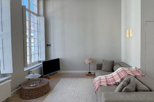 Karaktervol duplex-appartement met 2 slaapkamers en dakterras