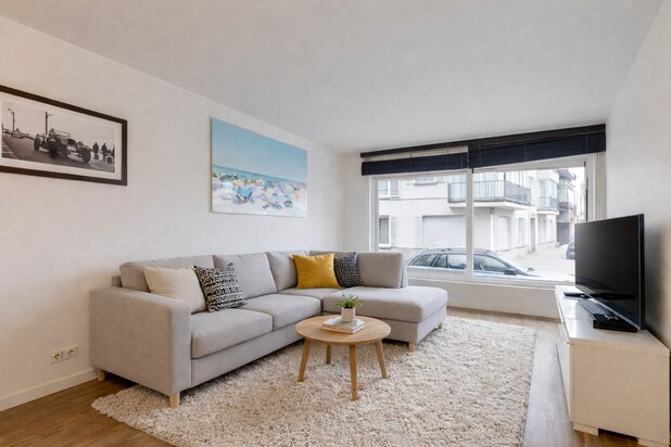 Instapklaar appartement te koop met zonnige tuin in Knokke!