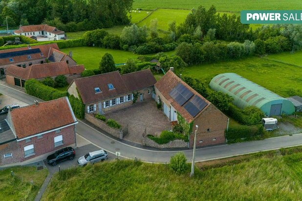 Renovated house for sale with a large shed in Lierde