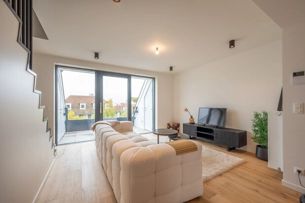 Superbe appartement duplex meublé à Duinenwater avec 2 terrasses et vue latérale sur le lac