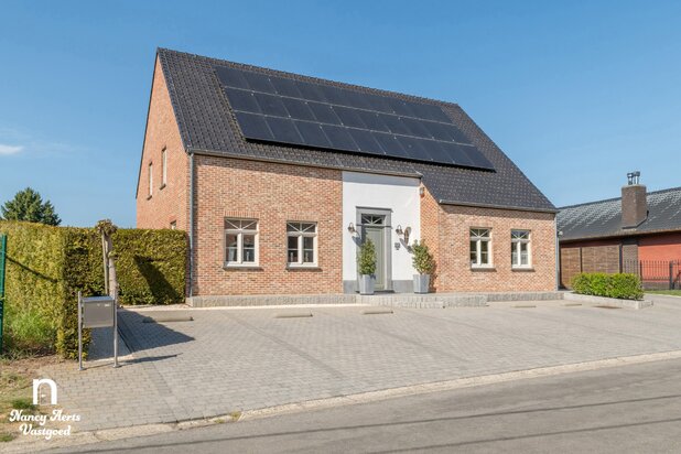 Gezinswoning met praktijkruimte en potentieel als zorgwoning