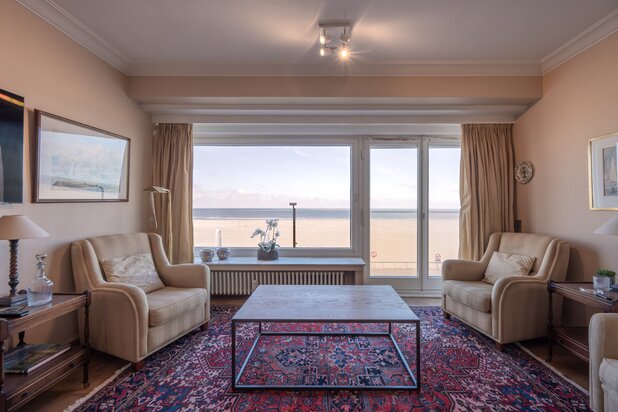 A two-bedroom flat in need of renovation with a direct sea view
