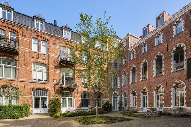 Unieke loft met mezzanine en terras in Colleghof – hartje Gent
