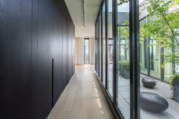 Penthouse met uitzonderlijke buitenruimtes en panoramisch zicht over Antwerpen