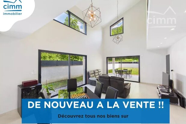 Maison mitoyenne par le garage