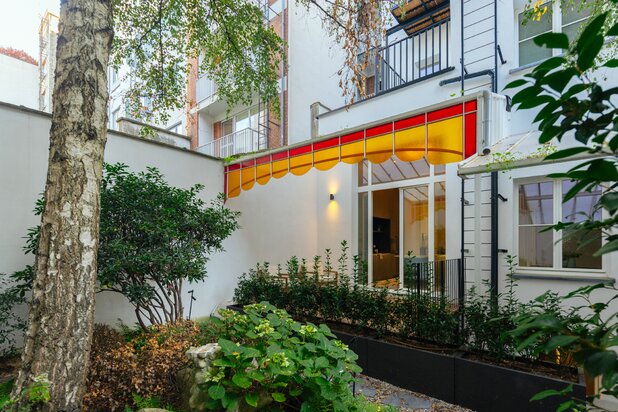 Luxueuze duplex met stadstuin in een historisch herenhuis