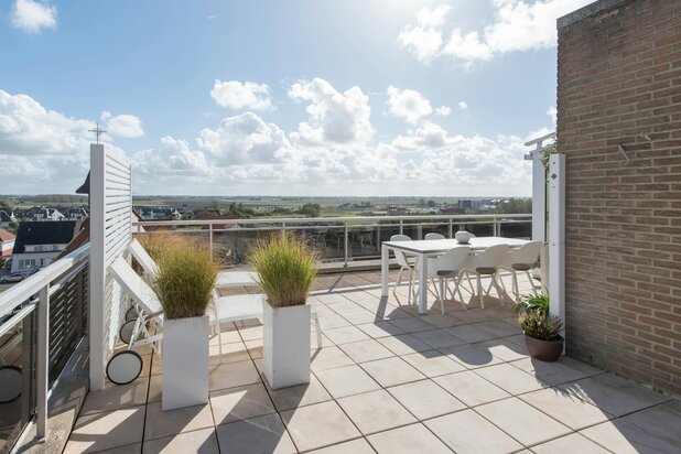 Uniek dakappartement met ruim terras en prachtig open zicht